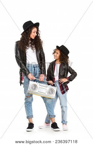Stylish Mother And Daughter With Vintage Boombox Isolated On White