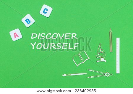 Concept School, Text Discover Yourself, School Supplies Wooden Minitures, Abc Letters On Green Backb