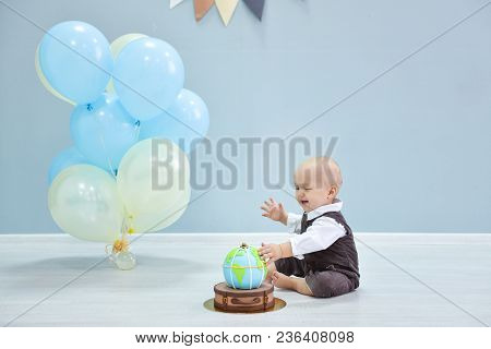 First Birthday For The Boy. Smash The Cake, A Thematic Birthday - A Travel, Trip. Globe. Researcher