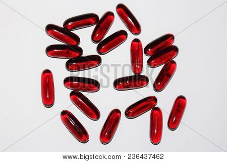 Black Cumin Oil. Black Cumin Oil Capsules Isolated On White Background. Medical Black Cumin.