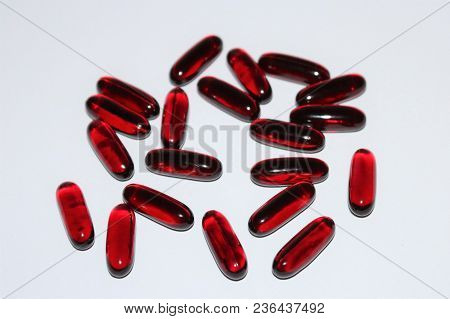 Black Cumin Oil. Black Cumin Oil Capsules Isolated On White Background. Medical Black Cumin.