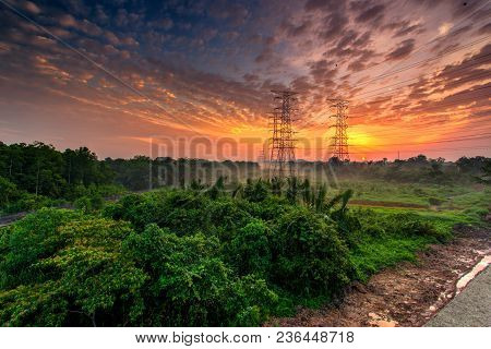 Railroad Against Beautiful Burning Sky At Sunrise. Industrial Landscape With Railroad, Colorful Blue