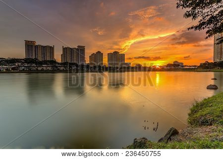 Beautiful Landscape Abstract Citybackground And The Light Of Sun Reflection Building On Water.panora