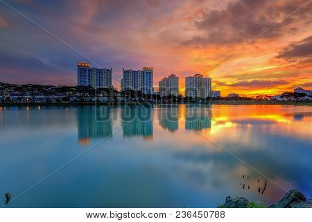 Beautiful Landscape Abstract Citybackground And The Light Of Sun Reflection Building On Water.panora
