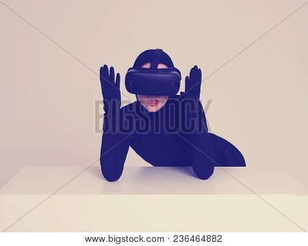 A Girl In A Black Suit Wears Vr Headset To Experience The New Technoligies Of Vitrual Reality. Hi-te