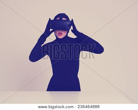 An Excited Girl Experiencing The Virtual Reality In The Vr Headset. Hi-tech Gadgets For Geeks And Te