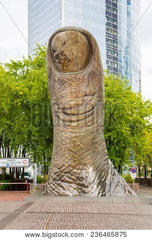 Paris, France - April 10, 2016: Thumb Sculpture Of Igor Mitoraj In La Defense With Unidentified Peop