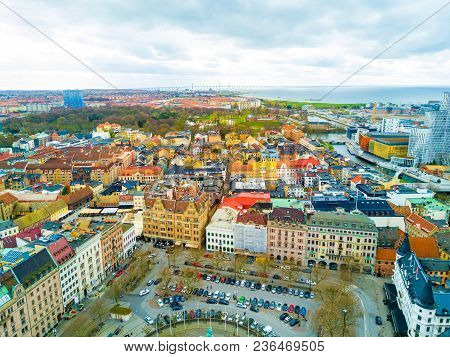 Aerial Malmo City View From Above With Harbour, Turning Torso And The Bridge On The Horizon