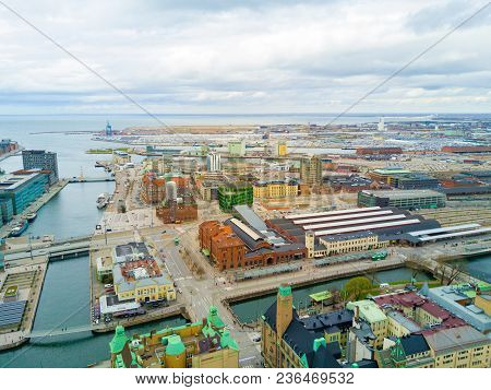 Aerial Malmo City View From Above With Harbour, Turning Torso And The Bridge On The Horizon