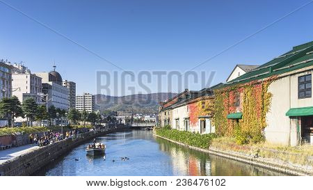Otaru, Japan - October 19, 2017 : Unknown Tourists On Otaru Canal Cruise, Bright Beautiful Autumn Da