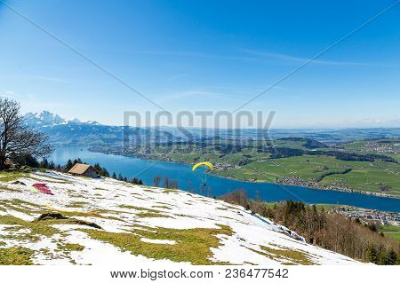 Panoramic View Of The Mountains And Lake View In Switzerland In The Early Morning.
