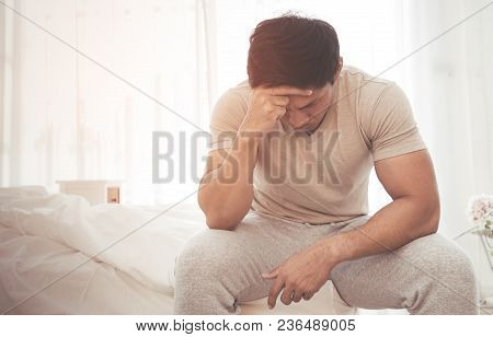 Asian Male Woke Up On Bed With Headache And Stress Out