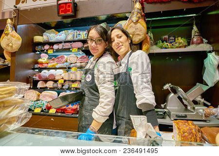 ROME, ITALY - CIRCA NOVEMBER 2017: staff at Carrefour Express store in Rome. Carrefour Express is a convenience store chain owned and operated by French retailer Carrefour.