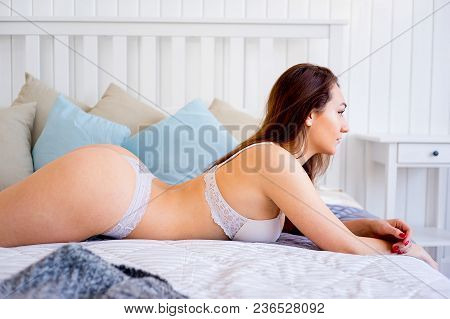 A Portrait Of A Beauriful Woman In A Lingerie