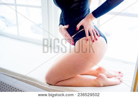 A Portrait Of A Beauriful Woman In A Lingerie