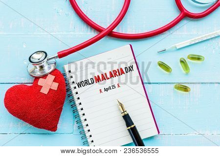 World Malaria Day April 25, Healthcare And Medical Concept. Stethoscope, Red And Black Heart, Thermo