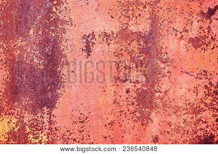Old Rusty Metal Sheet Colored Red Paint Cracked. Abstract Background. Metallic Background.