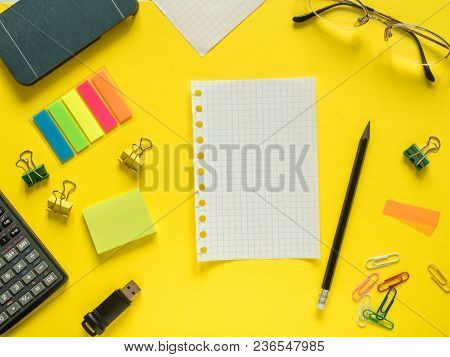 Business Flat Lay With Copy Space Calculator, Pencil, Notepad, Coffee Glasses On Colorful Yellow Bac