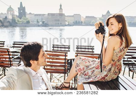 People, Leisure And Entertainment Concept. Pleased Beautiful Female In Summer Dress Males Photos Of 
