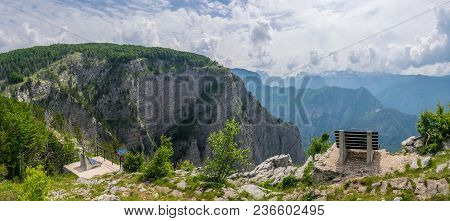 A Picturesque Bench For Meditation Is On Top Of A Cliff.