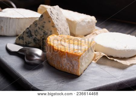 French Cheeses Plate In Assortment, Blue Cheese, Brie, Munster, Soft Goat Cheese
