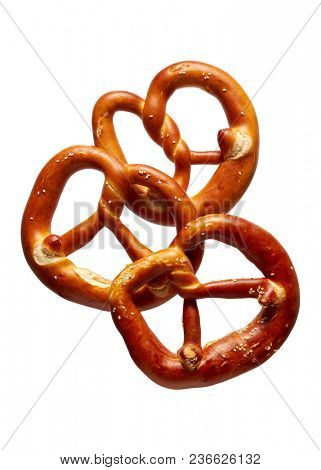 German Soft Pretzel. Three German bread pretzels on a white background.