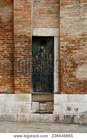 Ancient Wooden Door Of A Castle In The Medieval Town