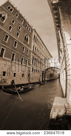 Ancient Bridge Of Sighs And Ducal Palace Photographed By Fish Eye Lens And A Gondola Boat In Venice 