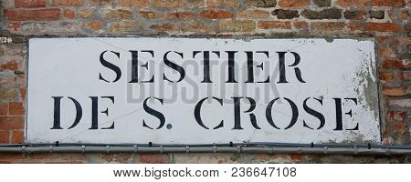 Road Sign That Means Saint Crux District In Italian Language In Venice Italy. The Name Sestier Means