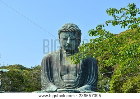 The Great Buddha Of Kamakura Is A Monumental Outdoor Bronze Statue Of Amitābha Buddha Located At The