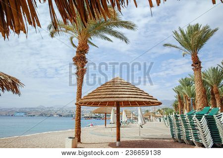 Beautiful Public Sandy Beaches On Red Sea In Eilat With Stro Umbrellas, Luxury Vacation Spa Resorts 