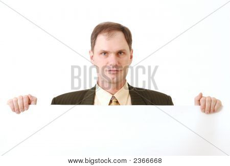 Businessman Holding A Large Blank