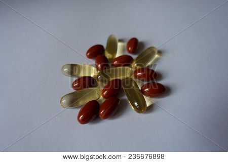 Capsules Of Fish Oil And Lutein Dietary Supplement