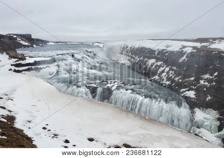 Gullfoss Waterfall In Winter. Beautiful Waterfall Gullfoss, Famous Landmark In Iceland