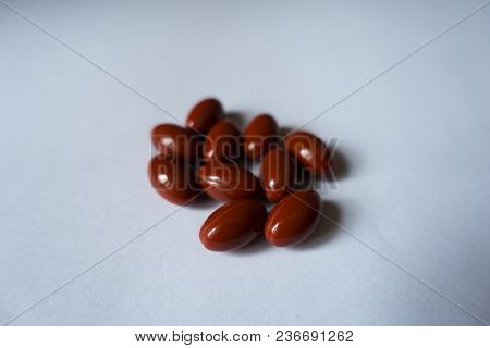 Several Red Capsules Of Lutein Dietary Supplement