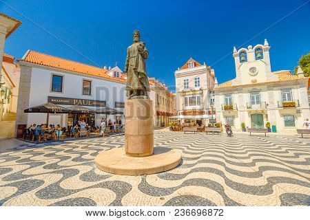 Cascais, Portugal - August 6, 2017: King Peter I Statues In Outubro Square, Historic Cascais Center,
