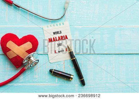 World Malaria Day April 25, Healthcare And Medical Concept. Stethoscope, Red And Black Heart, Thermo