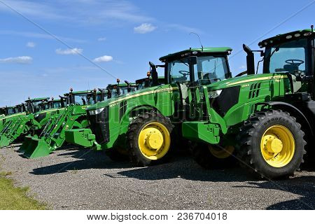 Hawley, Minnesota, August 22, 2017: The New 8320 R And 6195 R Tractors Are Products Of John Deere Co
