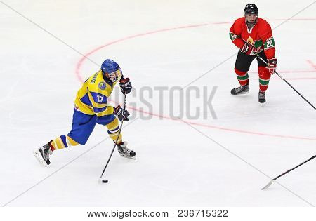 Kyiv, Ukraine - April 17, 2018: Olexander Peresunko Of Ukraine Shots A Puck During The Iihf 2018 Ice