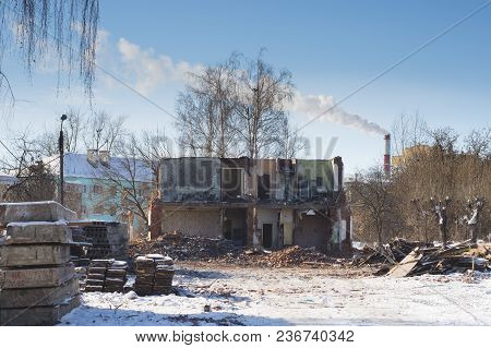 View Of A Dilapidated House. The Destroyed Walls In The Process Of Demolishing The Dilapidated House