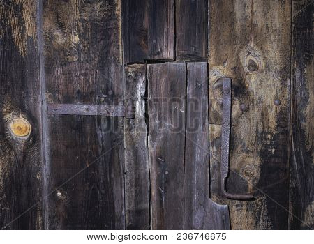 Exterior Detail Of A Wooden Tithe Barn Structure.