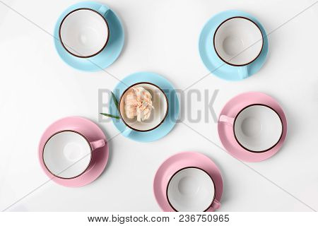 Clean Coffee Or Tea Set. Plenty Of Elegant Porcelain Light Blue Saucers And Pastel Pink Cups And At 