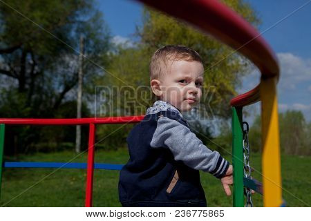 The Child Is Riding A Carousel, A Healthy Lifestyle Consept.