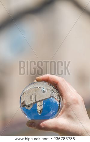Saint Nikola Church Tower Reflected In A Glass Ball Held By A Tourist, Perast, Kotor Harbor, Montene
