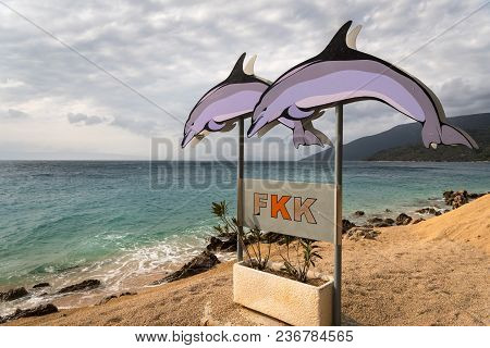 Sign With Two Dolphins Showing The Beginning Of The Nudist Beach (fkk Is The German Abbreviation Of 