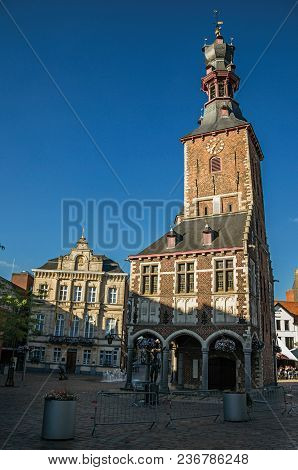 Tielt, Western Belgium - July 02, 2017. Tower And Buildings At Sunset And Blue Sky In Tielt. Charmin