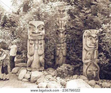 Indian Totem Poles In Capilano Suspension Bridge In Vancouver, Canada