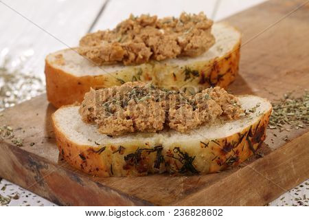 Sandwich With Norwegian Cheese-brunost On A White Wooden Table