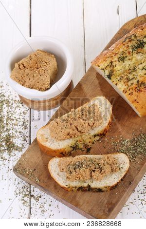 Sandwich With Norwegian Cheese-brunost On A White Wooden Table