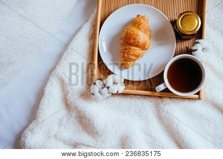 Big White Morning Cup Of Coffee, Crossant And Jam On The Wooden Tray Decorated With Cotton Flowers I